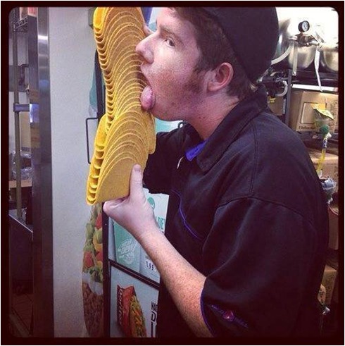 Taco Bell employee licks tacos